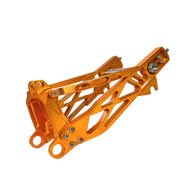 Billet V1 Swingarm (Softail 2018+) in anodized orange finish, combining style and durability for custom motorcycle builds.
