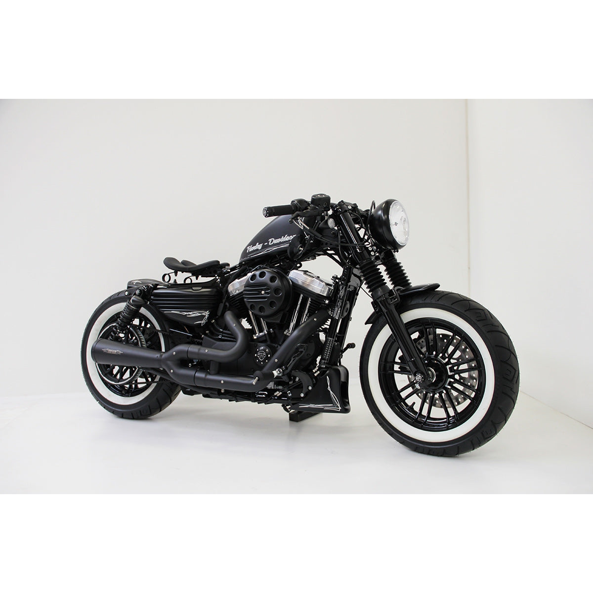Cult-Werk 7" headlight, black with clear glass Sportster